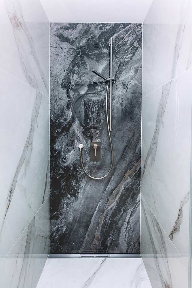 A nice bathroom with beautiful shower panels